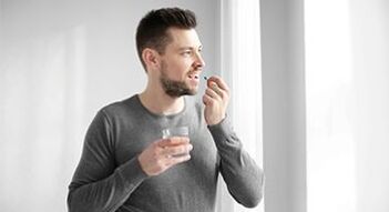 the man is taking medicine to treat prostatitis